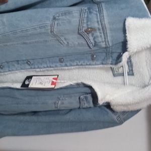 Winter fleece lined denim trucker jacket